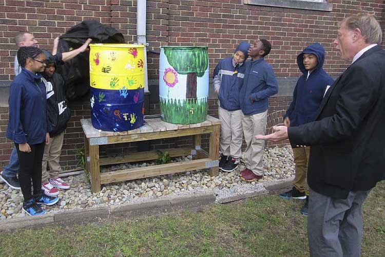 Unveiling of rain barrells, John Niedzialek