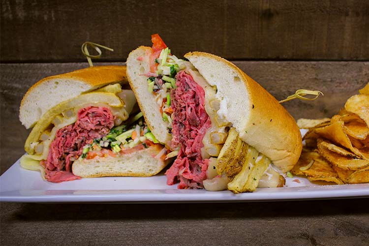 The Pittsburgh dish: A Pittsburgh style beef sandwich, shaved strip loin, provolone, fries, slaw tomato and creamy horseradish