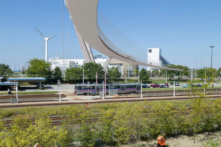 Lakefront pedestrian bridge designed by Boston architect Miguel Rosales.
