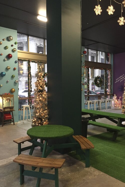 Artificial turf even covers the picnic tables. “It’s out of control over here,” says Lindsay Neidus.