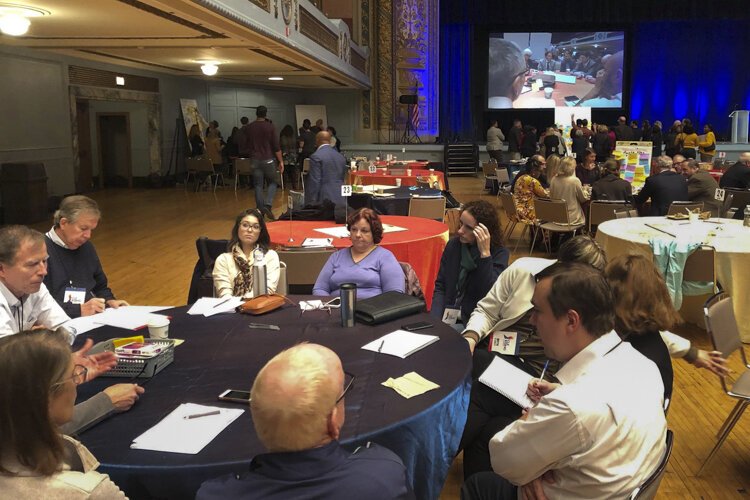 Individual working groups strategizing on different initiatives at the Cleveland Rising Summit.