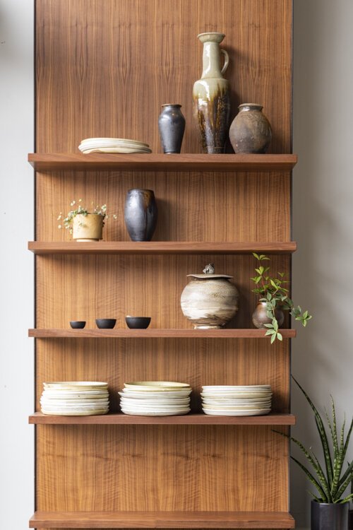 <span class="content-image-text">Potter Billy Ritter made the jugs, bowls, and pots for the shelves at Zhug</span>