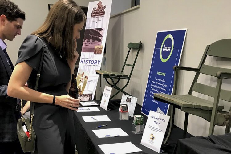 Lutheran Metropolitan Ministry's 50th anniversary celebration Sept. 21 at League Park included a silent auction.