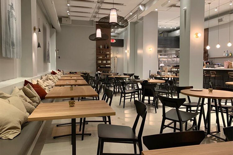 Empty tables, empty chairs at Zhug