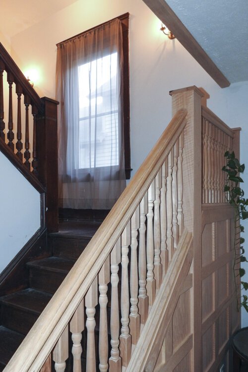 <span class="content-image-text">Daisy Avenue home staircase after renovations.</span>