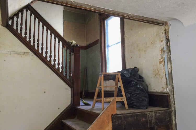 Daisy Avenue home staircase before renovations.