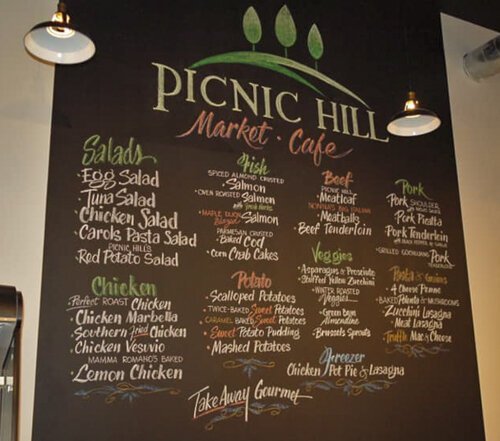 The Picnic Hill menu features a playful approach to gourmet food.