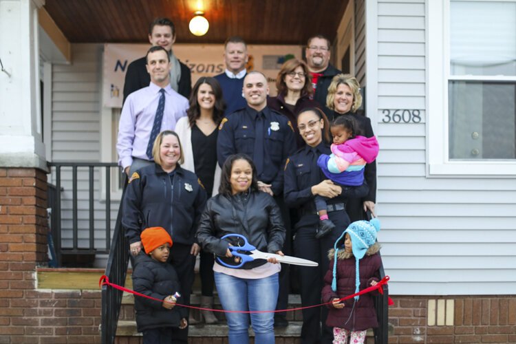 The City Mission’s New Horizons program home was unveiled to Star and her children  Friday, Dec. 20, with a ribbon-cutting ceremony.