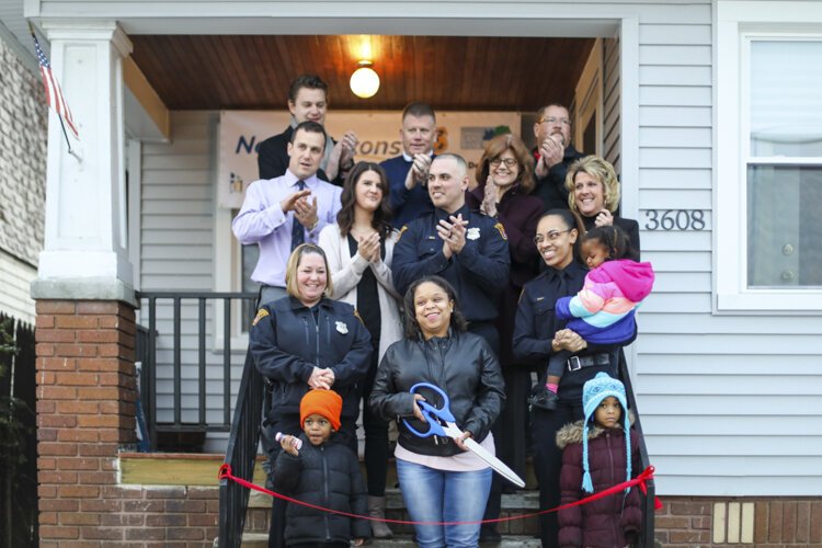 The City Mission’s New Horizons program home was unveiled to Star and her children  Friday, Dec. 20, with a ribbon-cutting ceremony.
