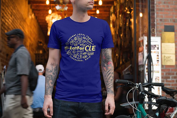 Show your support for our restaurant community with an #EatForCLE tee.