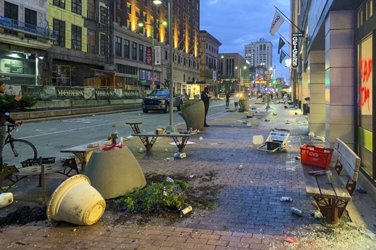 Clean up after the rioting in downtown Cleveland.