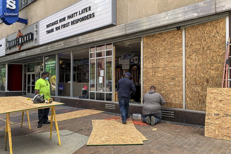 Clean up after the rioting in downtown Cleveland.