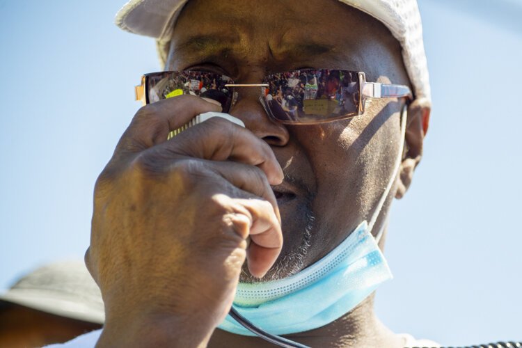 Desmond Franklin protests outside the Cleveland Police Second District Precinct.