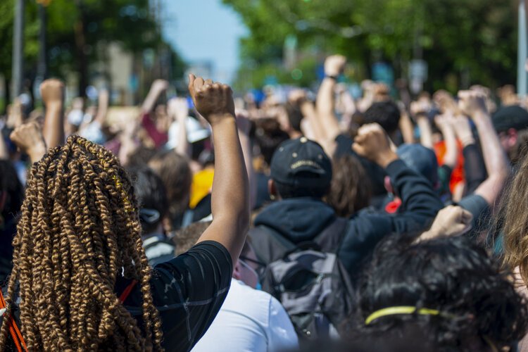 Desmond Franklin protests outside the Cleveland Police Second District Precinct.