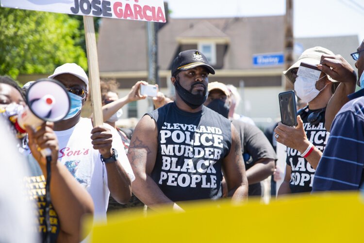 Desmond Franklin protests outside the Cleveland Police Second District Precinct.