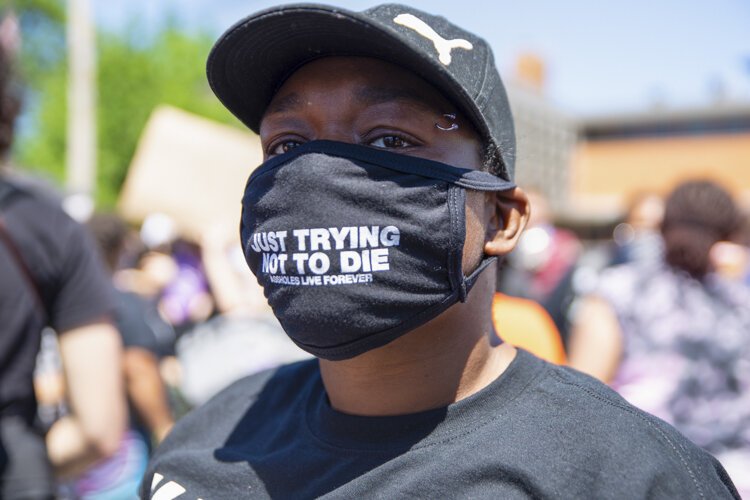 Desmond Franklin protests outside the Cleveland Police Second District Precinct.