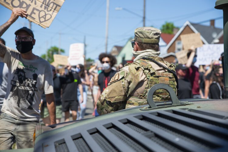 Desmond Franklin protests outside the Cleveland Police Second District Precinct.