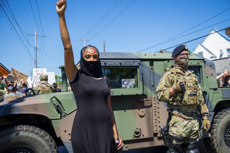 Desmond Franklin protests outside the Cleveland Police Second District Precinct.