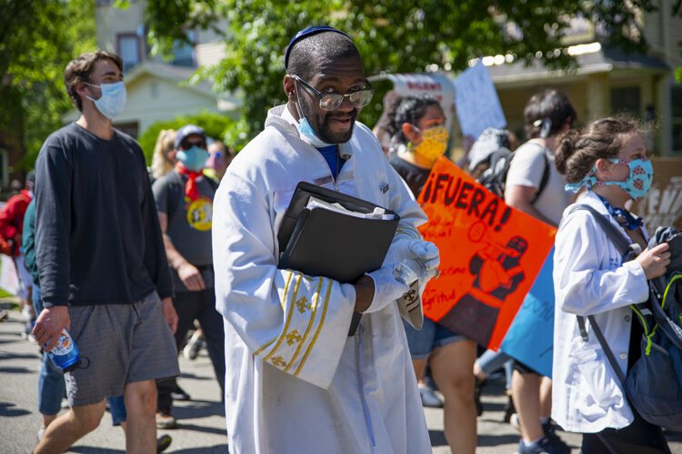 Desmond Franklin protests outside the Cleveland Police Second District Precinct.