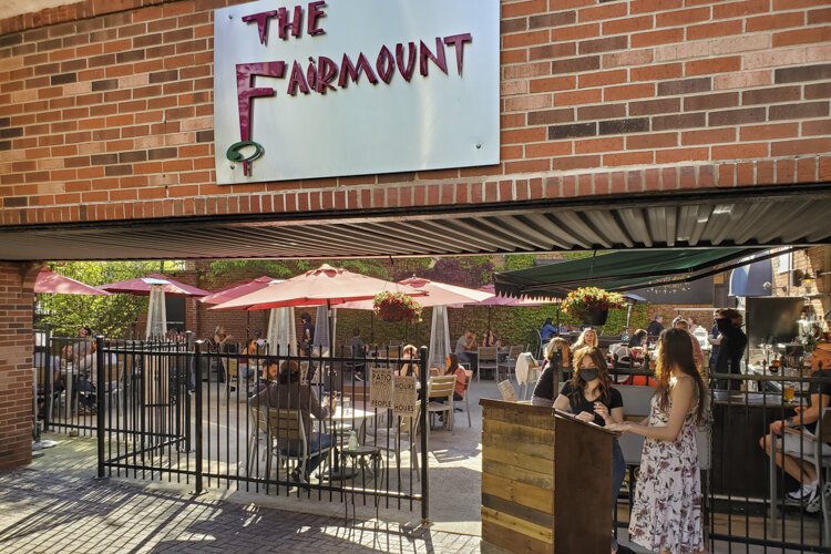 The tables are spaced at least six feet apart at The Fairmount, and guests were spaced out on the patio that normally seats about 85 but has been reduced to 60.