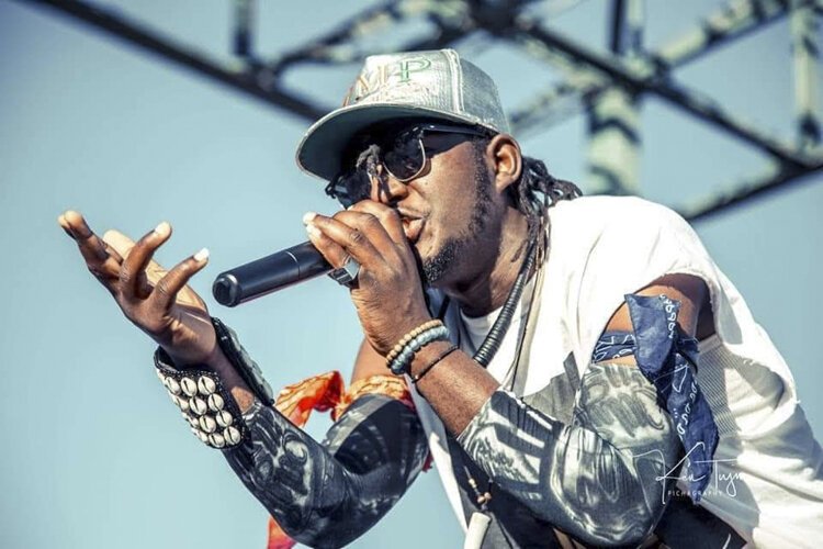 Real Mane TMP performs on stage in Massachusetts.