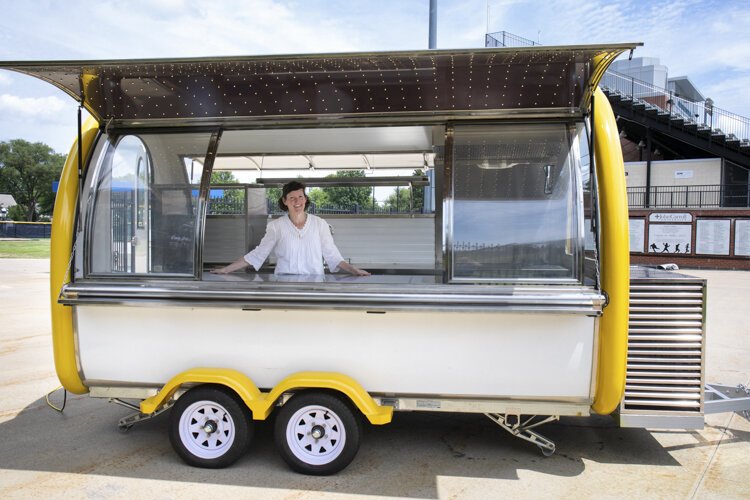 Students in JCU’s entrepreneurial class have developed and are now implementing The Food For Thought food buggy with a social service spin of feeding the homeless.