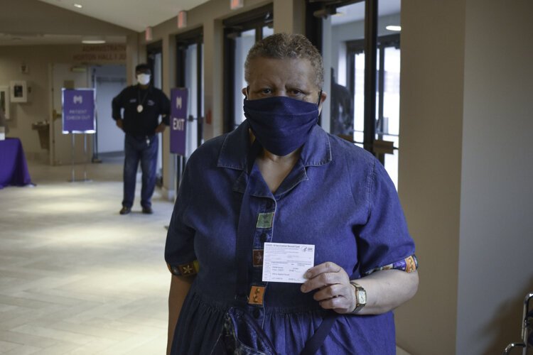 Cleosene Johnson, 72, poses after getting the second dose of the vaccine at a clinic at her church, Affinity Missionary Baptist Church. She’s been going to this particular church since 1976.