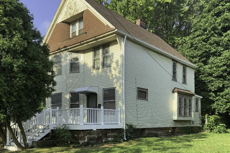 An after shot example of a house in need of repair in Cuyahoga County.