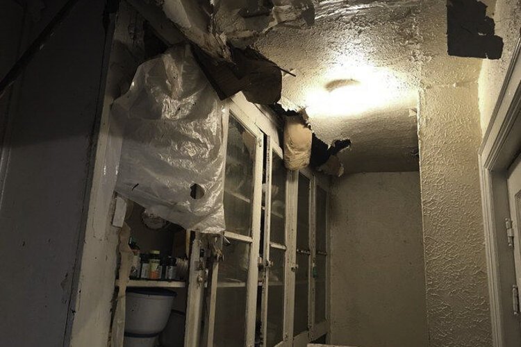 A before shot example of a house interior in need of repair in Cuyahoga County.