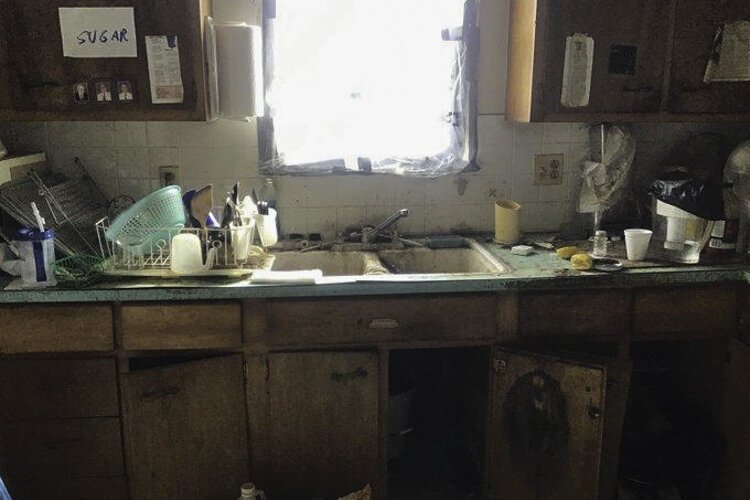 <span class="content-image-text">A before shot example of a house interior in need of repair in Cuyahoga County.</span>