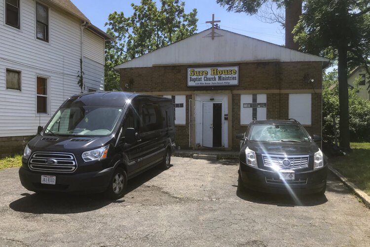 <span class="content-image-text">Church van program outside Sure House Baptist Church</span>