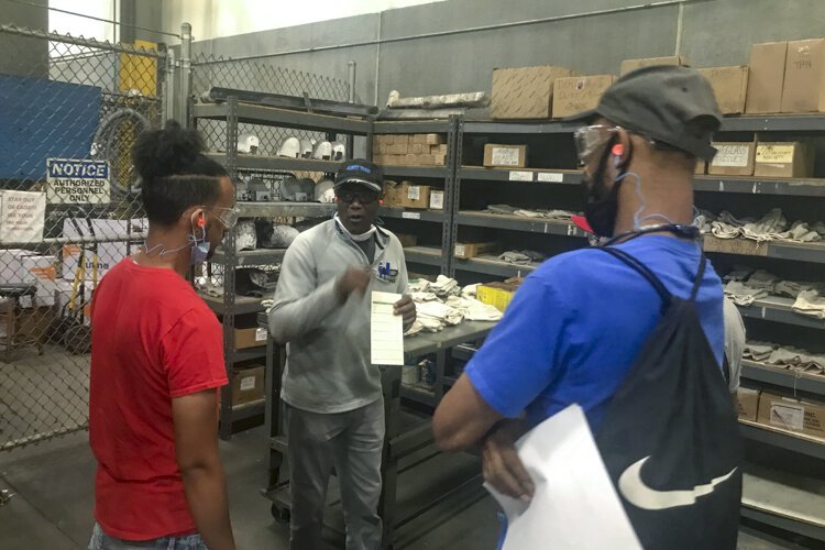 <span class="content-image-text">Churcn van program workers touring General Die Casters photo</span>