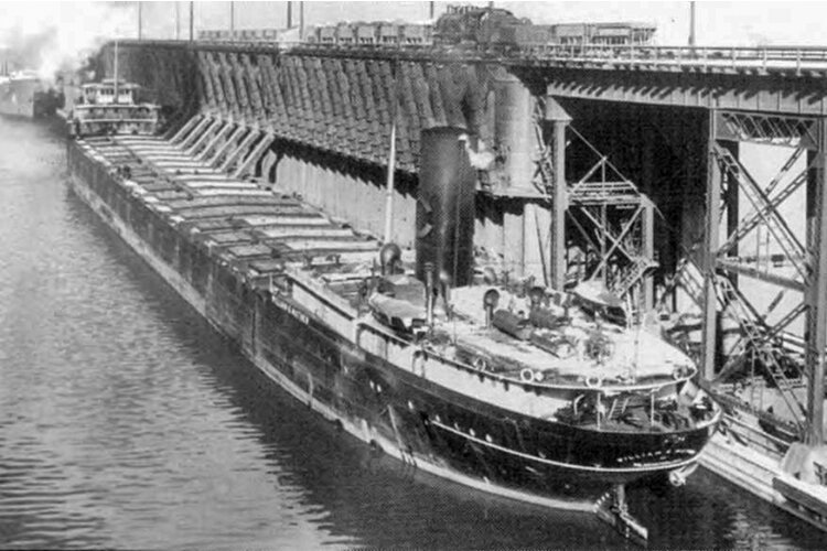 William G. Mather Steamship being loaded with 14,000 tons of iron ore sometime between the late 1920s to the 1930s.