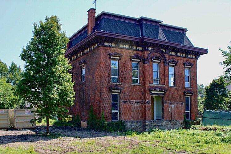 <span class="content-image-text">Exterior shot of the Cook-Bousfield Mansion, currently under construction.</span>