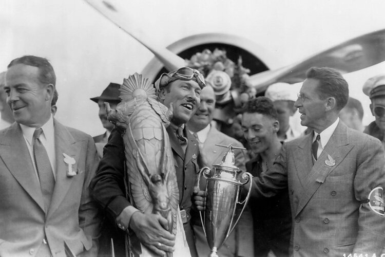 Fred Crawford (right) presents the Thompson Trophy to aviator Roscoe Turner at the Cleveland National Air Races.