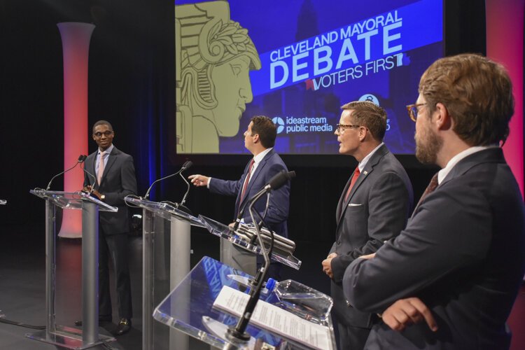 Cleveland mayoral candidates Justin Bibb, Ross DiBello, Kevin Kelley and moderator Nick Castele.