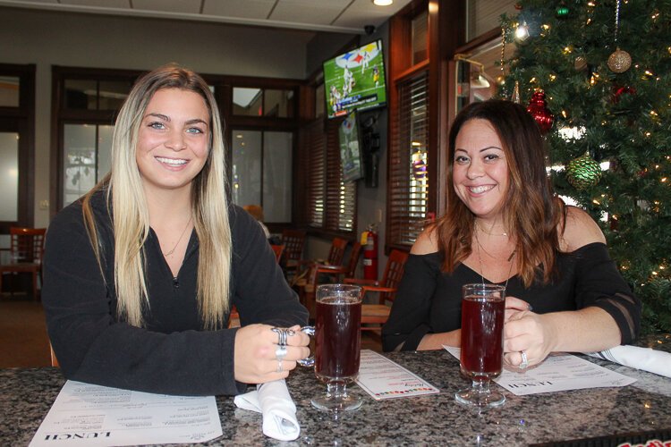 Rustic Grill patrons at StoneWater enjoy some Cleveland Glögg