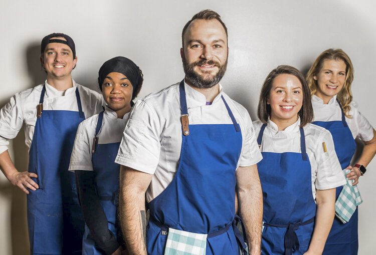 Joshua Ingraham, Co-Owner at Go Buddha and staff.