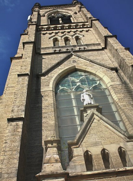 The St Stepen church tower dominates the main entrance from West 58th Street.