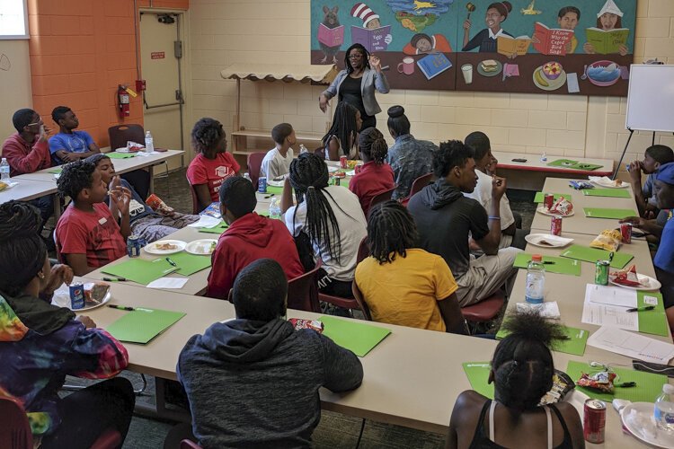 <span class="content-image-text">Promise/Huntington Bank financial literacy course for students, taught by Promise ambassador Charmaine Jordan</span>