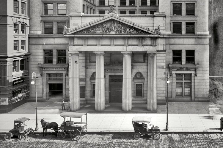 <span class="content-image-text">The entry of the 1902 Citizens Building on Euclid Avenue was decorated by a triangular panel with a bas relief that illustrated the elements of American commerce.</span>