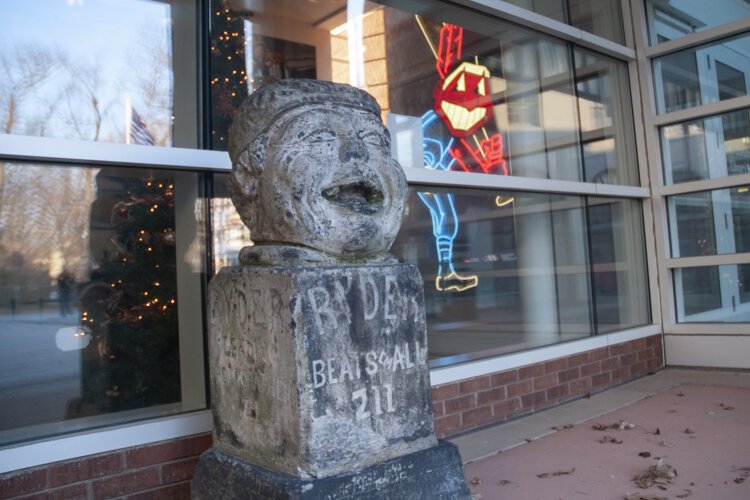 Smiling Solly with the 28-foot-tall Chief Wahoo from the old Municipal Stadium in the background at the Western Reserve Historical Society.