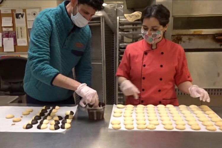 <span class="content-image-text">Daniel Seddiqui making macaroons at Hotel Dupont</span>