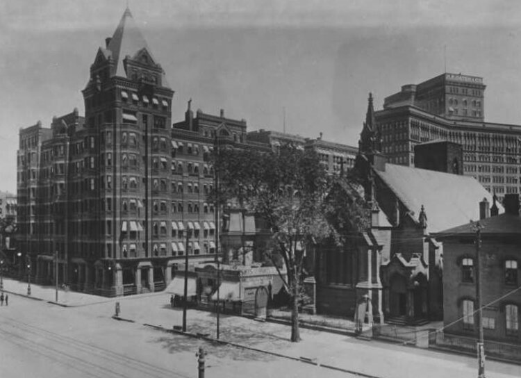The original Trinity Cathedral built in 1854 and demolished to make way for the Leader Building. The building across the street is the Hollenden Hotel at the intersection of modern E6th and Superior.