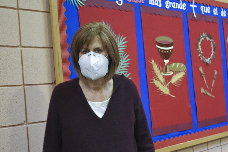 Maureen Dee, a volunteer with the Hispanic Roundtable advocacy group in Cleveland, at La Sagradia Familia Church on Cleveland’s West Side.