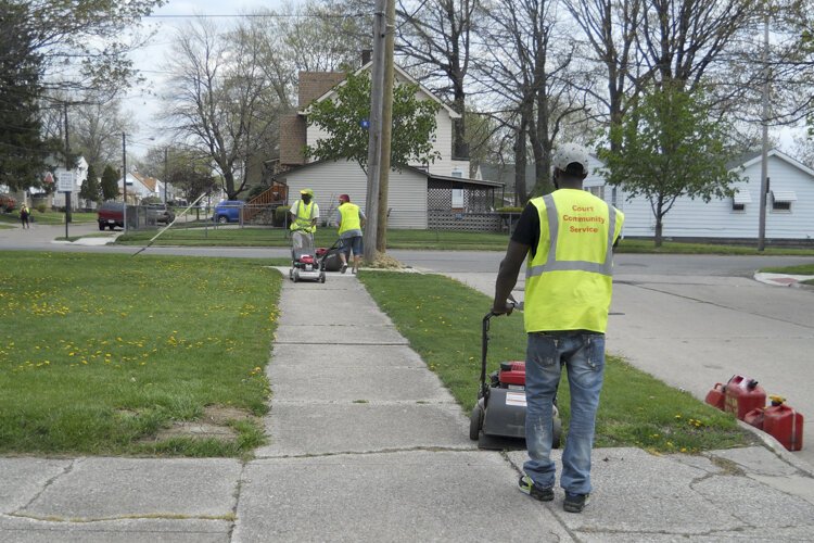 Adult offenders are providing community service hours in lieu of a jail sentence and instead of paying court costs and fees.