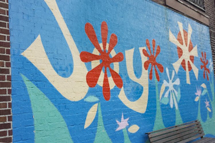 Joy mural at Lee Road and Silsby Road, SE corner in Cleveland Heights