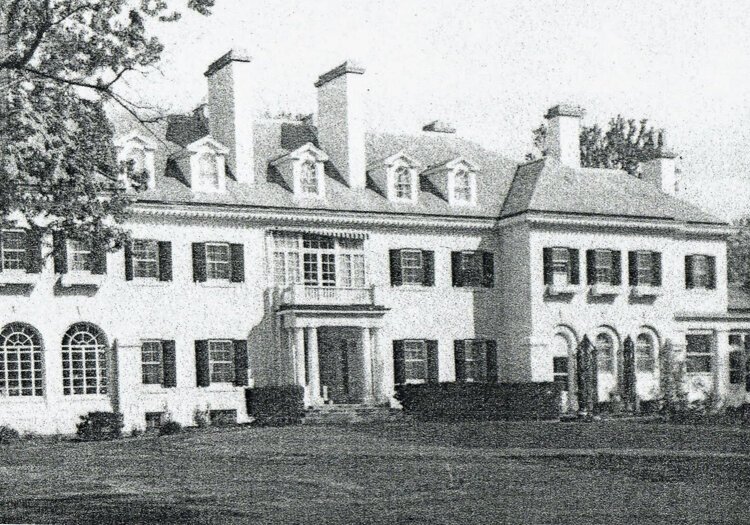 This stucco-clad mansion at 12717 Lake Shore Boulevard was built in 1910.