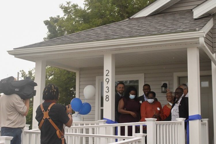 <span class="content-image-text">Stakeholders, including Burten, Bell, Carr director Joy Johnson, cut the blue ribbon at 2938 Minnie Rd., in Kinsman.</span>