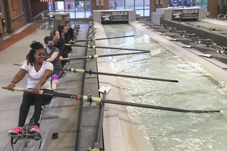 <span class="content-image-text">Novice rowers practice drills in the “tank room” at The Foundry Community Rowing & Sailing Center</span>